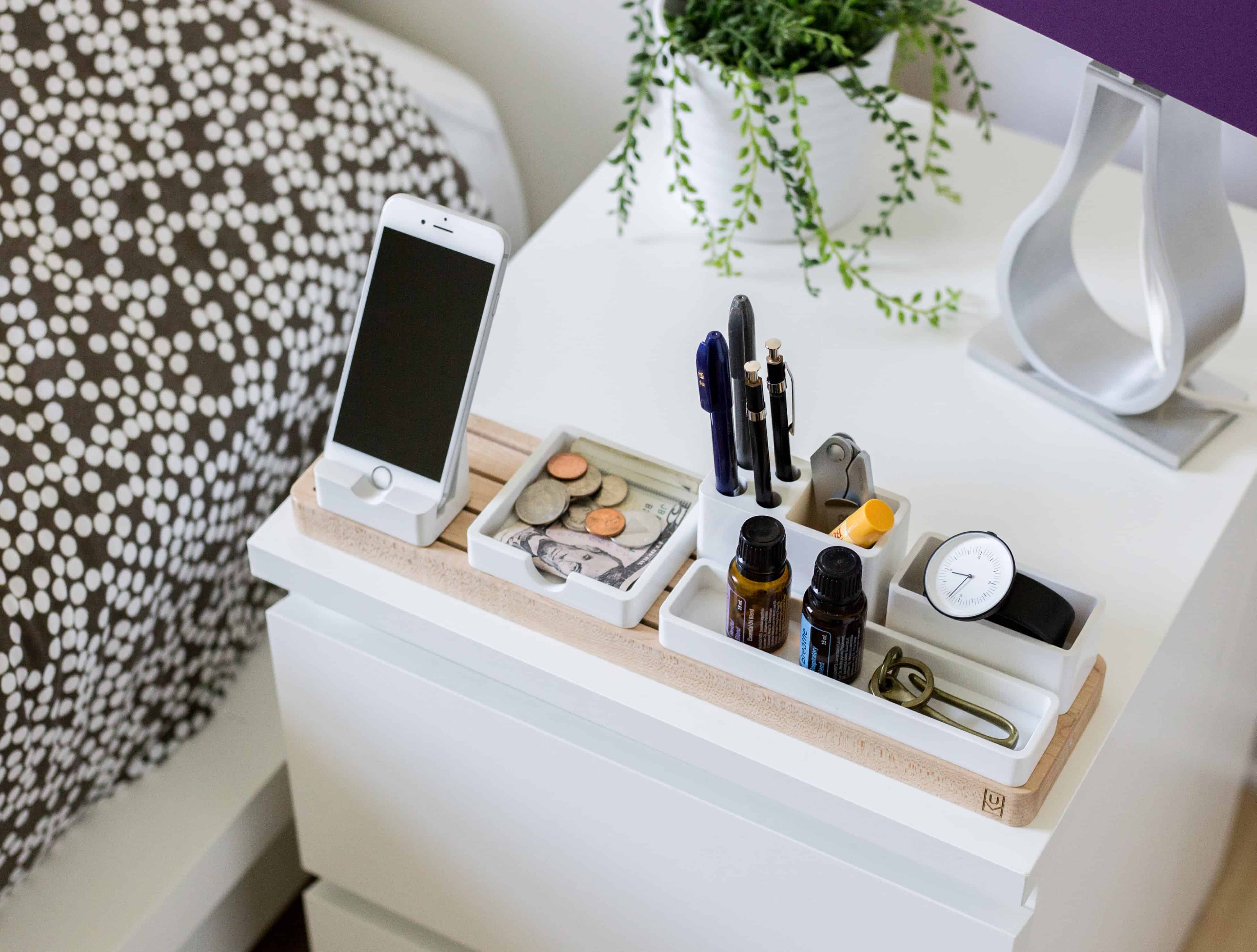 It’s ok to store items on your bedside table, and it will look decluttered, if you arrange them in an organised way.
